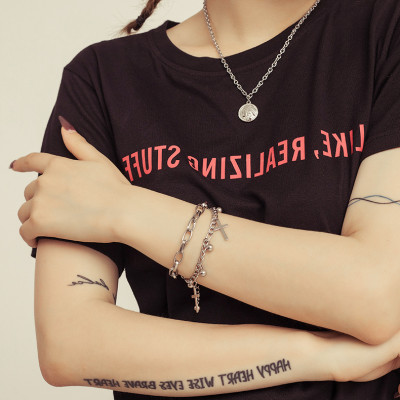 Lắc tay thời trang nữ chữ thập sành điệu