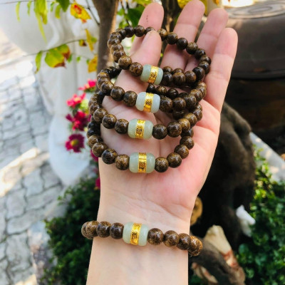 Vòng đeo tay, lắc tay phong thủy từ gỗ trầm hương tự nhiên mix lu thống đá bạch ngọc