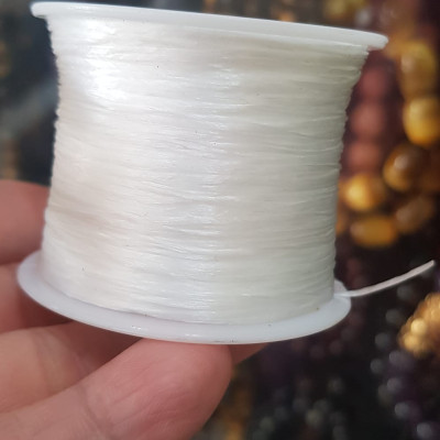Cuộn Dây Thun CO GIÃN màu Trắng xỏ vòng hạt chuỗi Dây này là dây thun chuyên xỏ vòng chuỗi màu Trắng, có đủ màu Anh Chị đang đeo chuỗi muốn thay dây khác cho vòng thì đặt cuộn Thun chỉ này nhé 