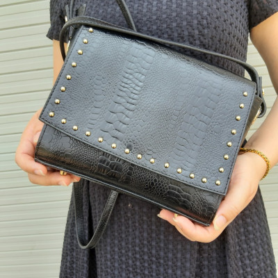 Túi da bò vân chân đà điểu sang trọng