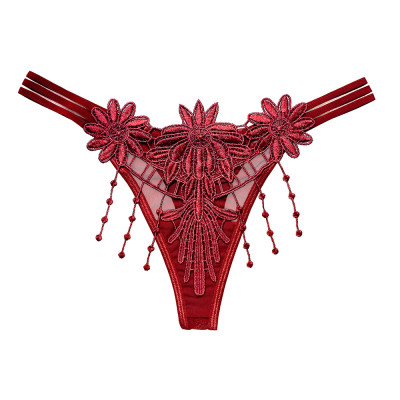 Quần lót nữ lọt khe dây tua rua bông hoa ở trước