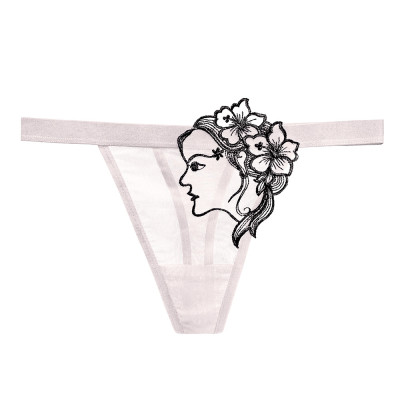 Quần lót nữ lọt khe thêu hình mặt người quyến rũ