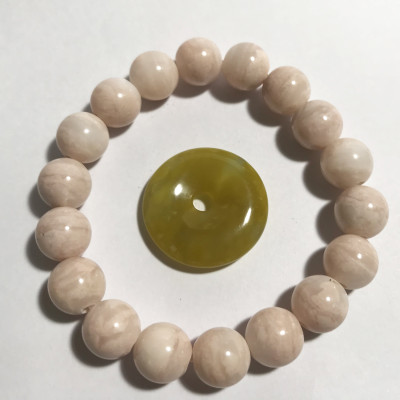 Vòng tay chuỗi hạt ngọc canxidene màu hồng phấn 16 li đá tự nhiên của Việt Nam vongtaychuoihat16li