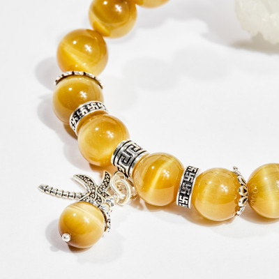 Vòng tay phong thủy đá mắt hổ vàng tâm charm cây 10mm mệnh thổ , kim - Ngọc Quý Gemstones