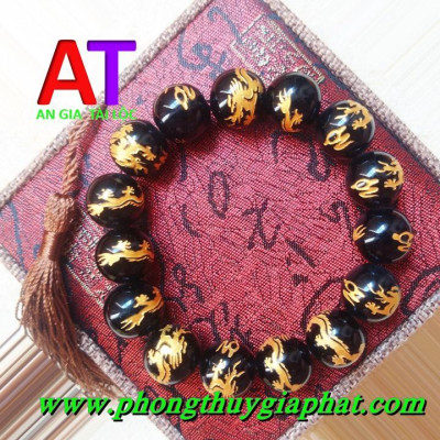 Vòng đeo tay đá đen huyền thạch chạm rồng