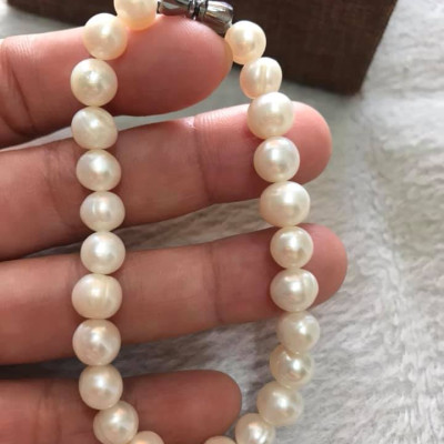 Vòng NGỌC TRAI NỮ ĐEO SIZE 7LY5 VÒNG GỒM 25 HẠT ĐÚNG CUNG SANH MÀU TRẮNG